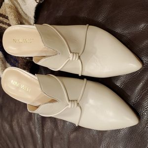 Women's Nine West Mules Sz 8.5, off- white color, approximately 4" heel.